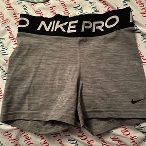 grey nike pros size: small 3”